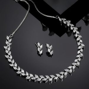 ZENEME Women Plated Leaf Design American Diamond Studded Jewellery Set